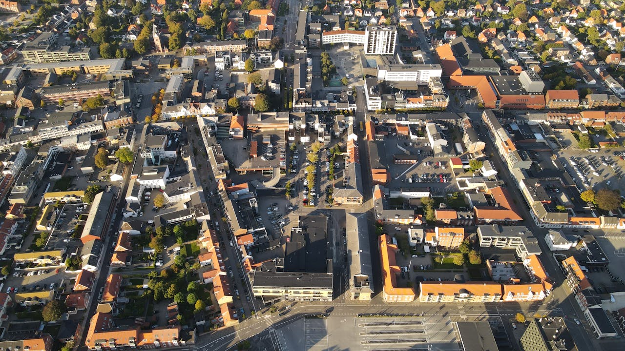 Aerial view of Herning, Denmark showcasing urban architecture and streets.
